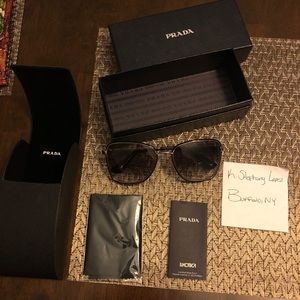 Prada Black/pale gold sunglasses